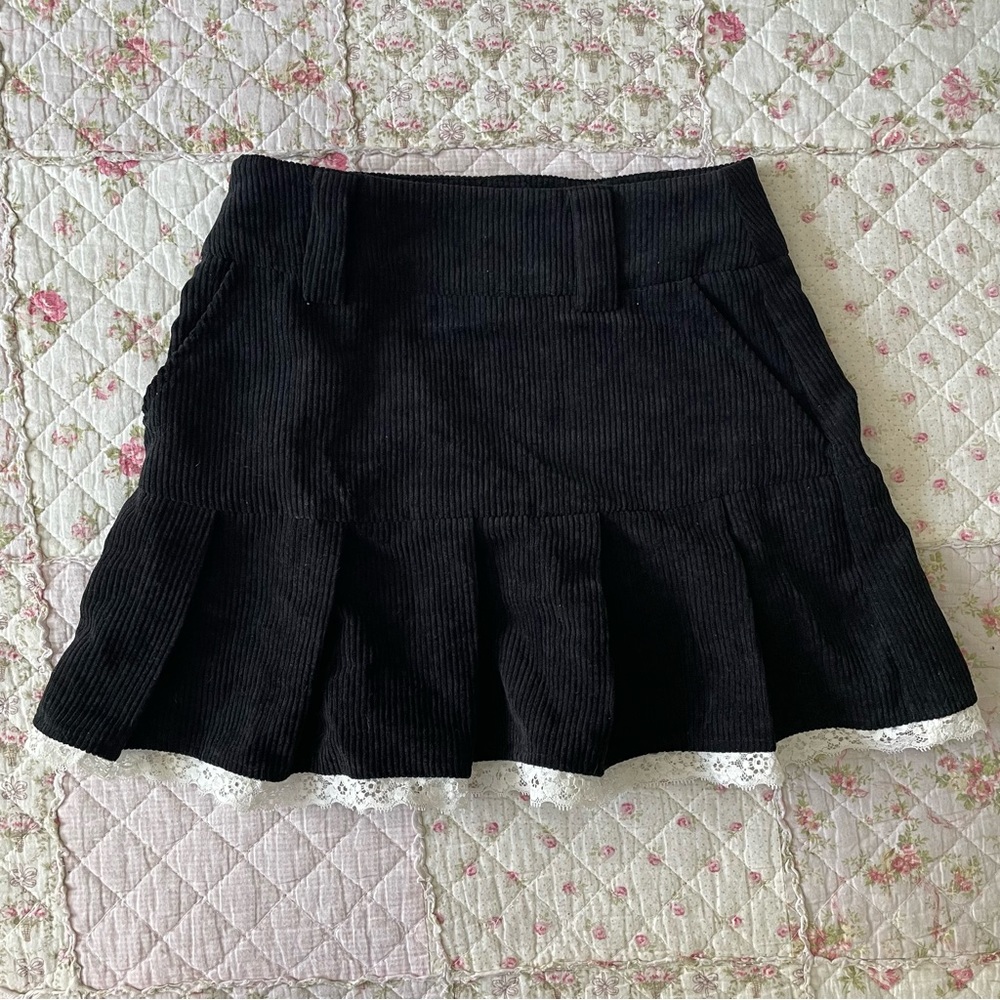 Black corduroy pleated skirt with lace trim